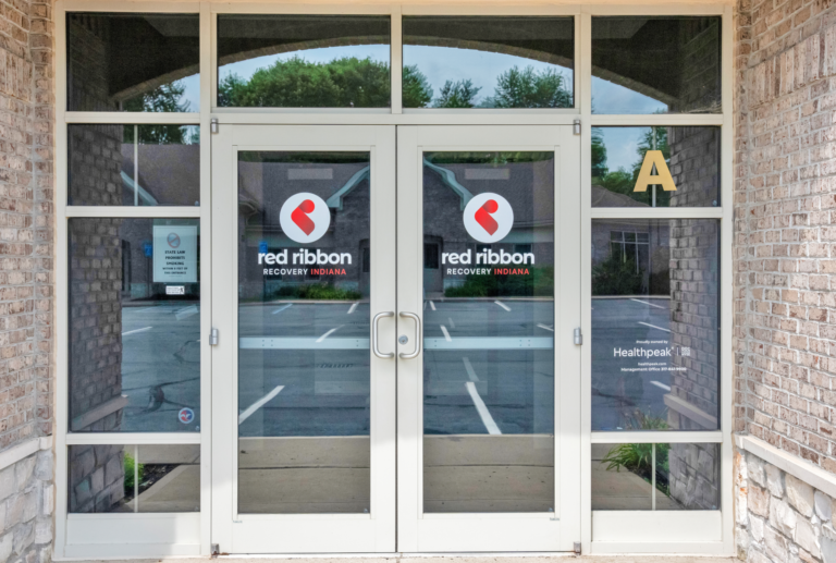 Entrance to Red Ribbon Recovery Indiana facility for addiction treatment and recovery services.