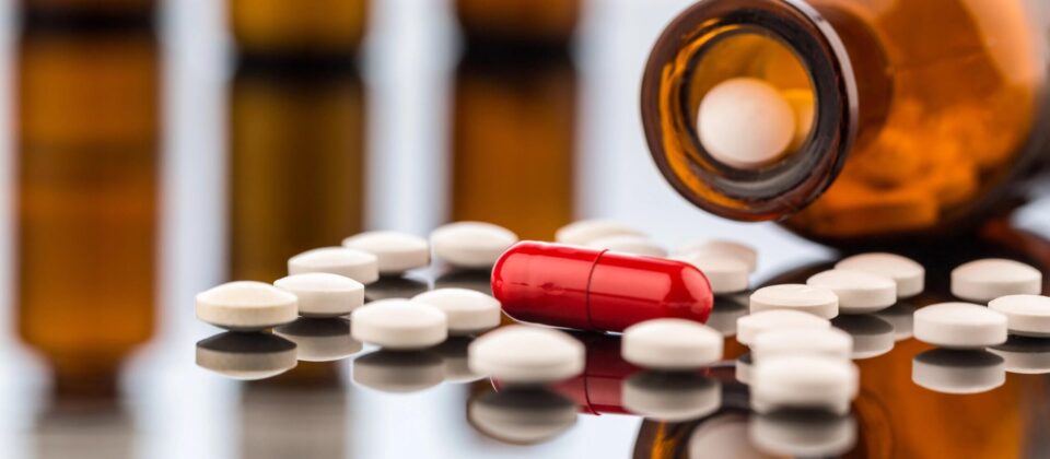 Abuse recovery medication pills and bottle for addiction treatment and substance abuse support.