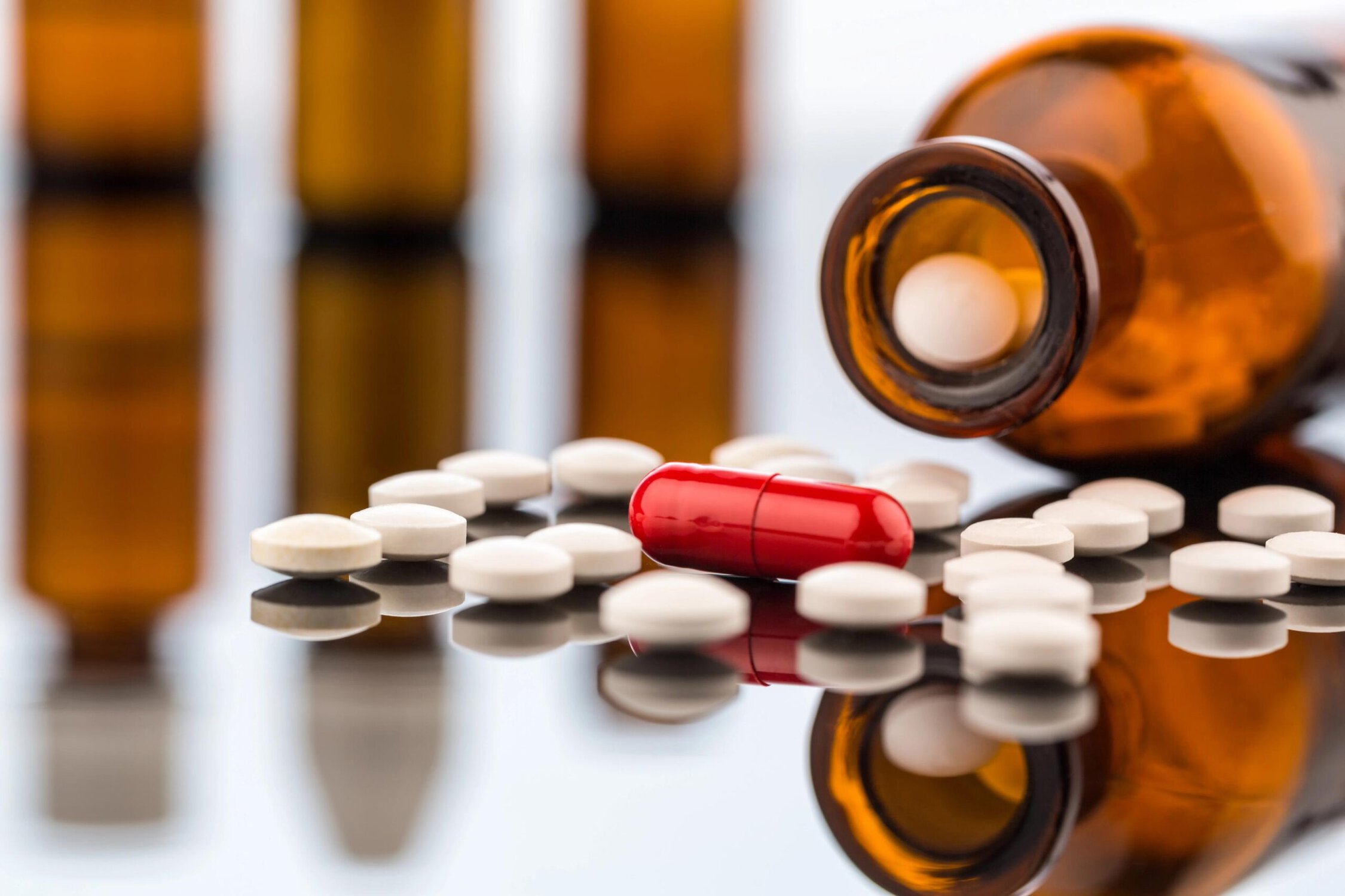 Abuse recovery medication pills and bottle for addiction treatment and substance abuse support.